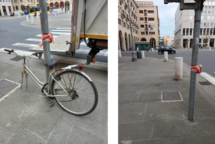 Foto della rimozione di una bici abbandonata in piazza Grande